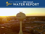 Sky shot of the Meridian Water Tower at sunset with the words "City of Meridian 2021 Annual Water Report"