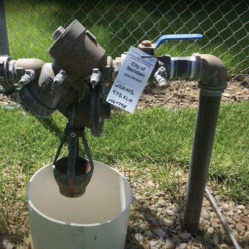 Backflow system with a City of Meridian tag
